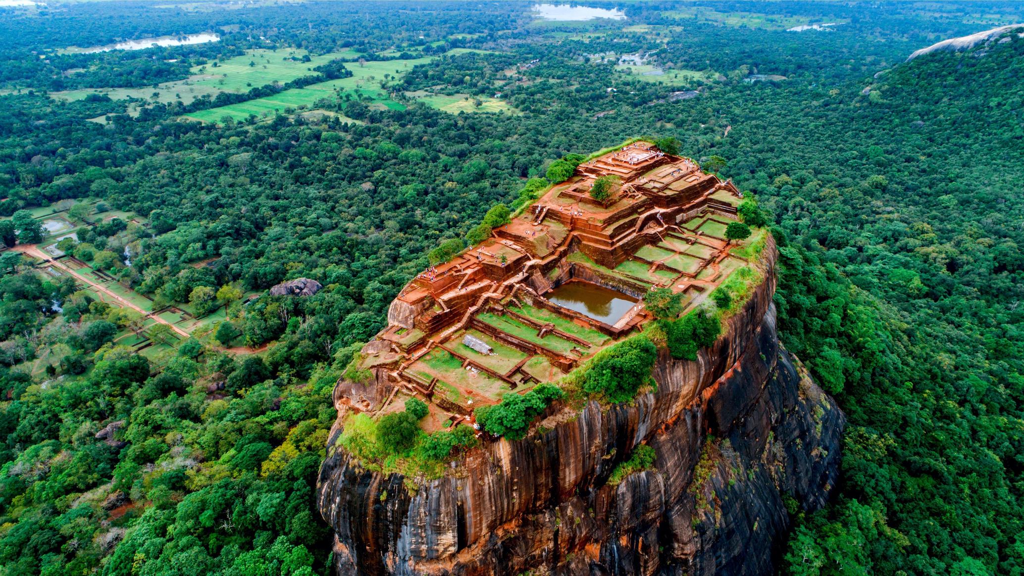 The ancient rock fortress of Sigiriya rising above the Sri Lankan jungle